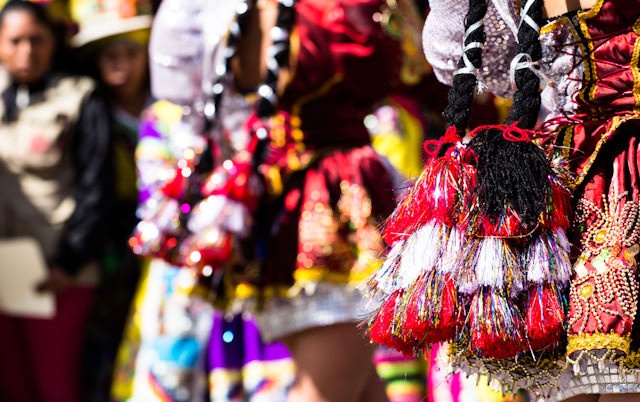 3 - Colourful dancers in Cuzco's main plaza